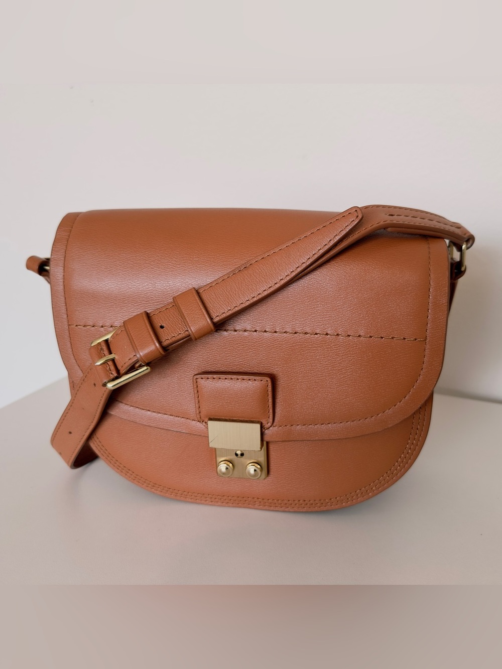 EUC 3.1 Phillip Lim Pashli Saddle Bag in tan leather